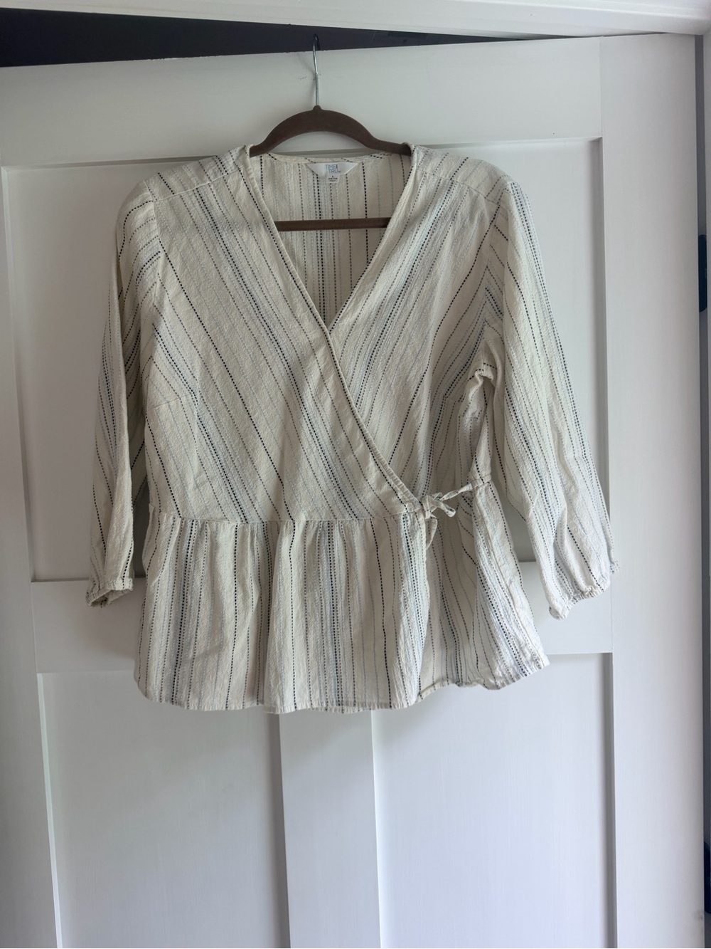 Women’s Cream Wrap Peplum Top with Subtle Stripes